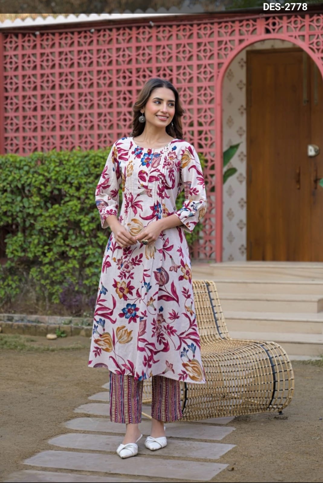 Model wearing a floral kurta set from the EvoStyle collection